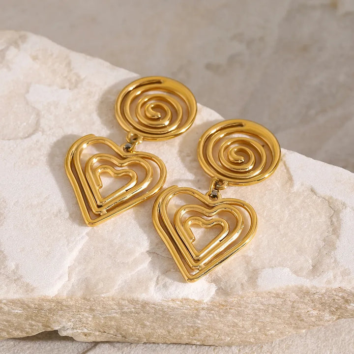 Gold-plated stainless steel heart earrings with spiral top design, elegant and romantic accessory for any outfit.