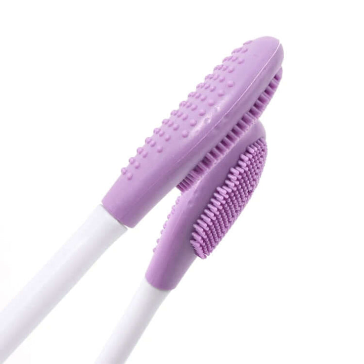 Double-headed silicone face brush closeup on a white background