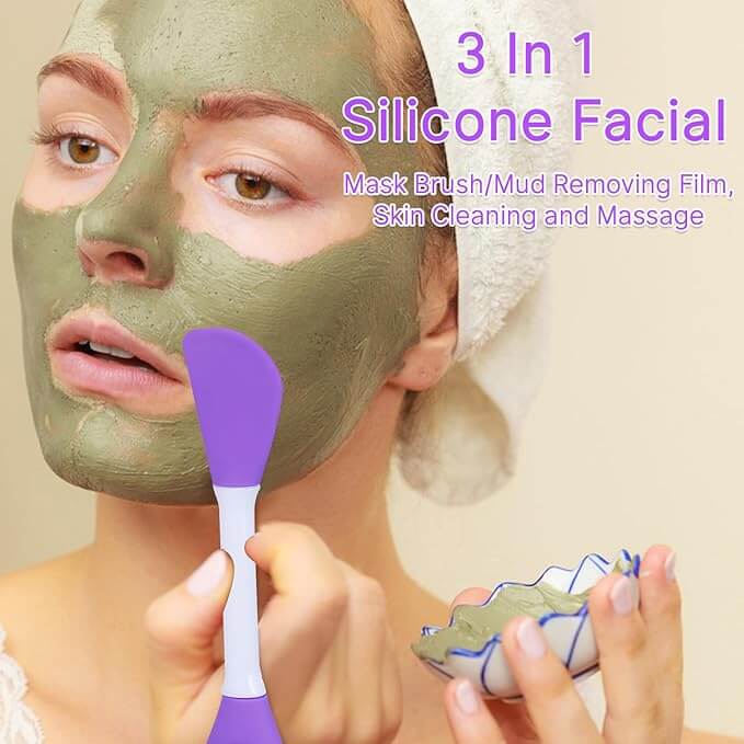 A person is using a purple Double Headed Silicone Face Brush to apply a green facial mask, while the text highlights a 3-in-1 silicone facial product.