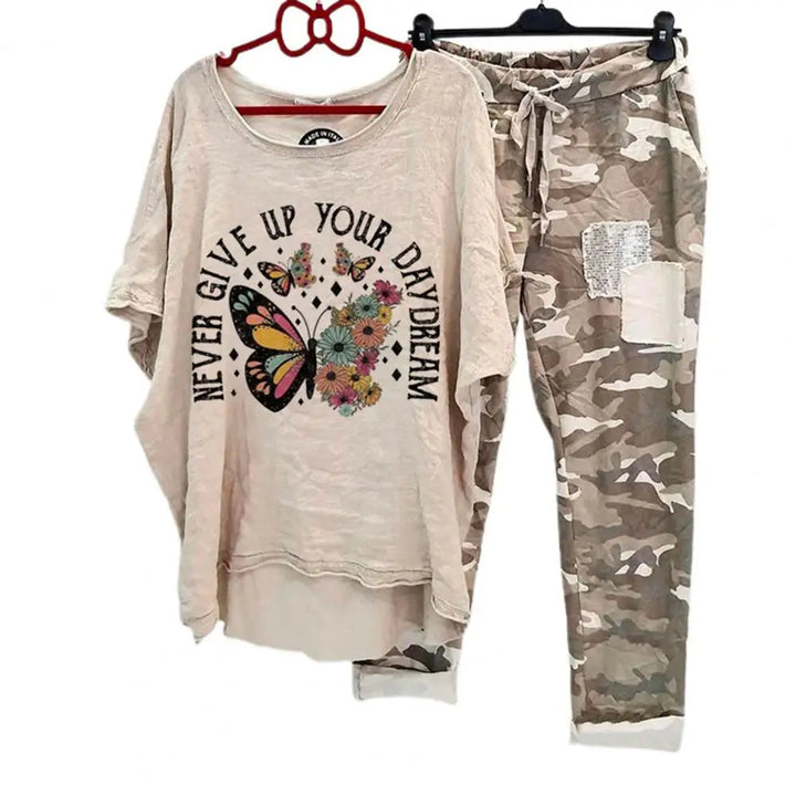 Women Cotton Blend Sportswear Set featuring a butterfly graphic top and camouflage pants.